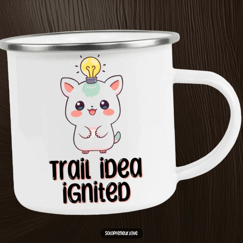 Funny camping mug with a playful creature and a lit lightbulb above its head, perfect for enjoying beverages while brainstorming outdoors.
