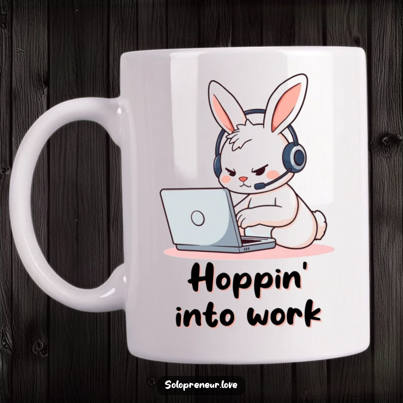 Funny determined rabbit character wearing a headset, furiously typing on a laptop, featured on this humorous and motivating mug.