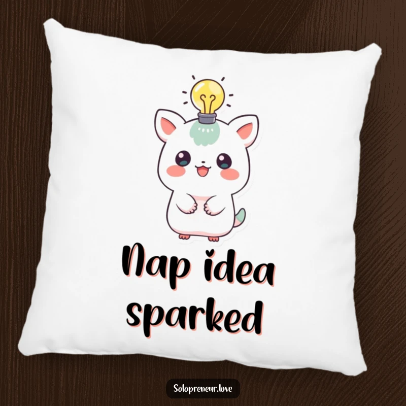 Funny pillow featuring a playful creature with a glowing lightbulb above its head, offering comfortable support and a symbol of bright ideas.