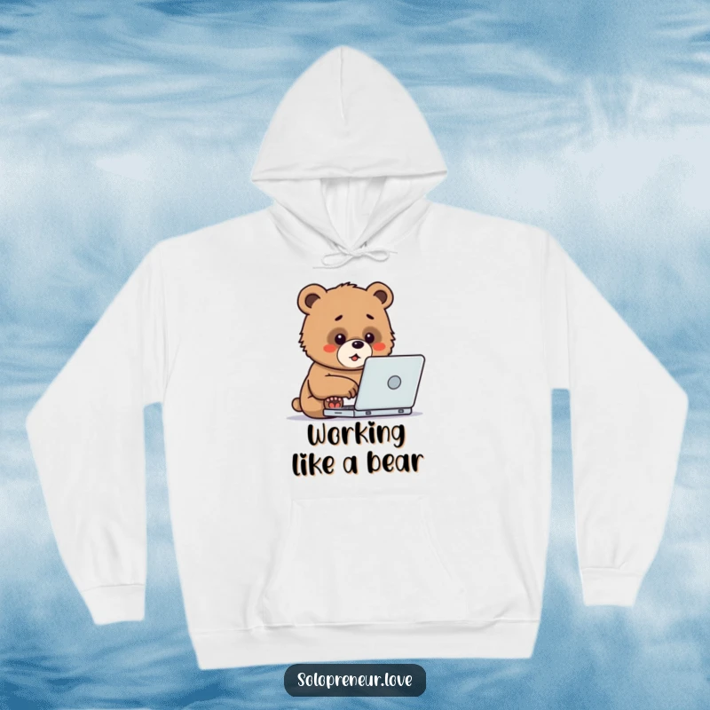 Funny Hoodie showcasing a determined bear cub enthusiastically typing on a laptop, offering warmth and a symbol of focused effort.