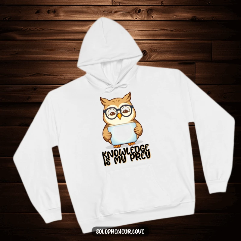 Funny owl wearing glasses, intently reading a glowing tablet, printed on a soft and intelligent hoodie.