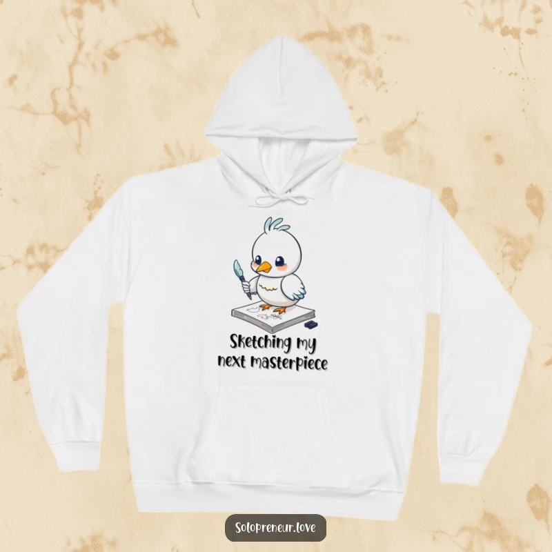 Funny bird hoodie featuring a creative character sketching with a feather pen, providing warmth and a humorous artistic touch.