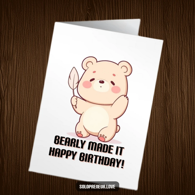 Funny Free Printable Birthday Card showing a strong bear character hilariously struggling to lift a single, tiny feather.