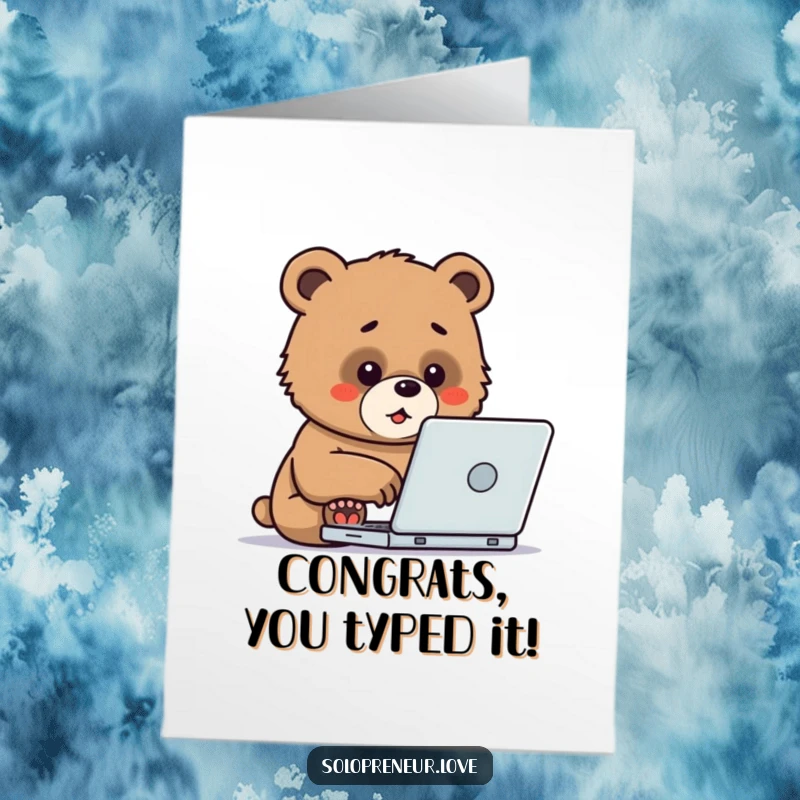 Funny Free Printable Congratulations Card: A determined bear cub typing enthusiastically on a laptop, celebrating a win.