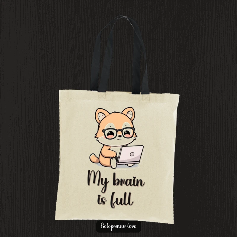 Funny animal tote bag featuring a cute, bespectacled animal character working on a tiny laptop, perfect for carrying study essentials.